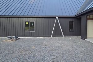 Steel Board and Batten Metal Siding On a New Construction Home