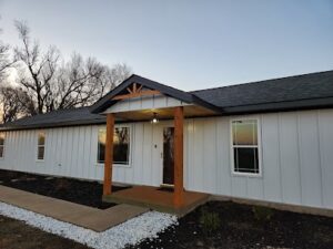 Modern house with porch and landscaping