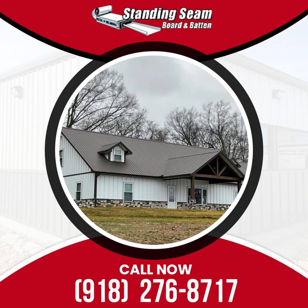 A newly constructed residential home featuring a gray standing seam metal roof paired with white board and batten siding.